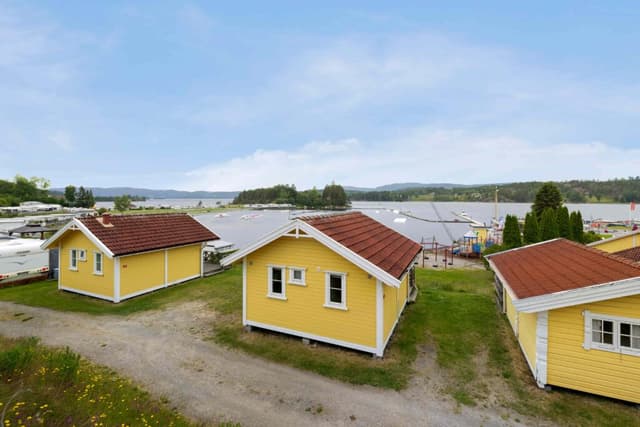 Telemarkhytta - stuga i norsjö - exteriör